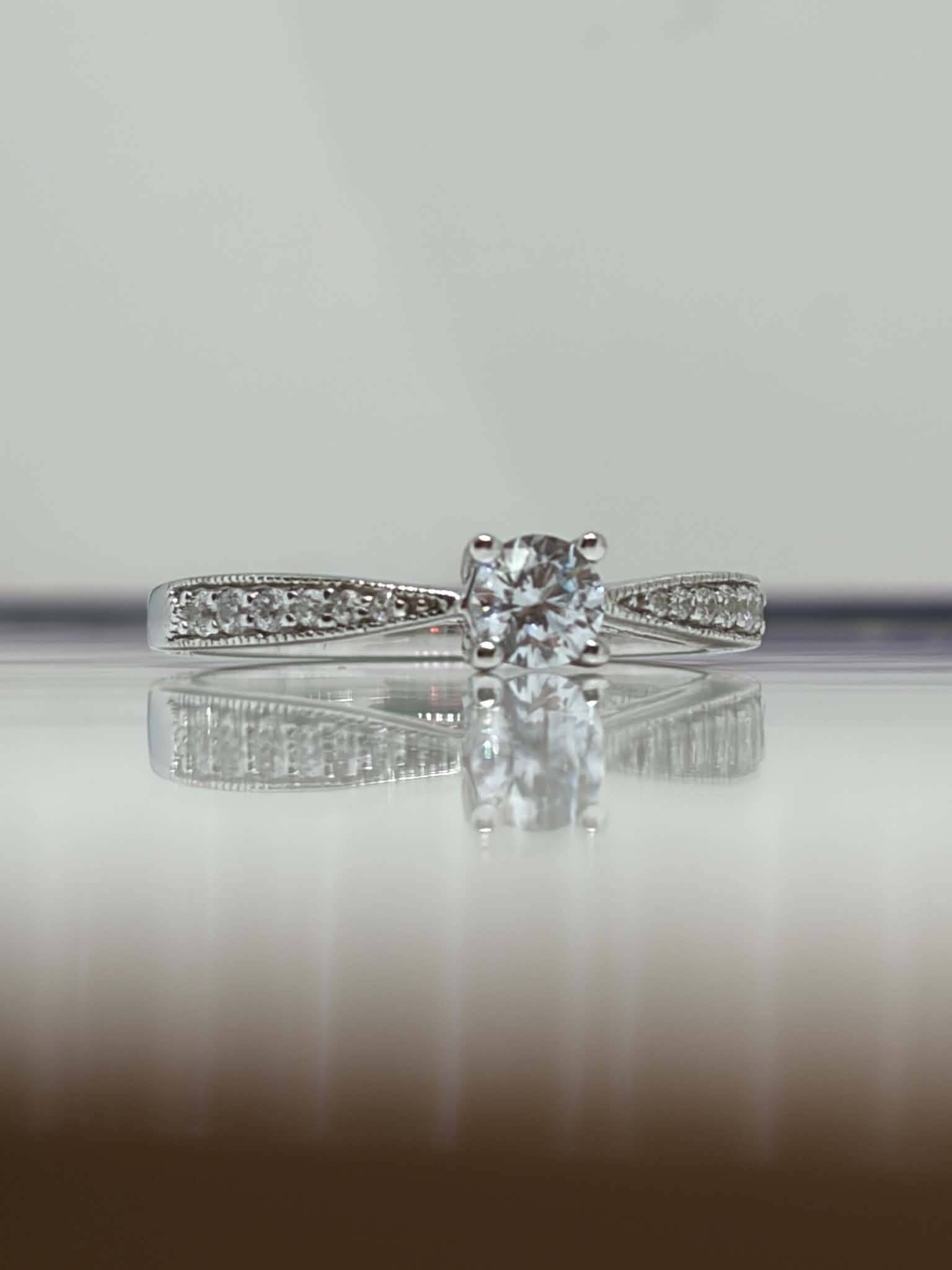 Amore Sterling Silver Cubic Zirconia Solitaire Ring: Size M